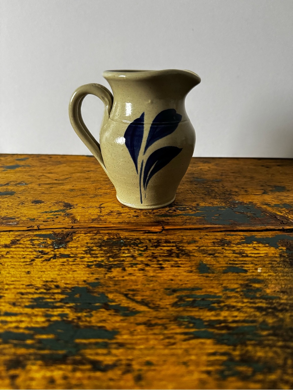 Cream Stoneware Creamer with Cobalt Blue Floral Accent